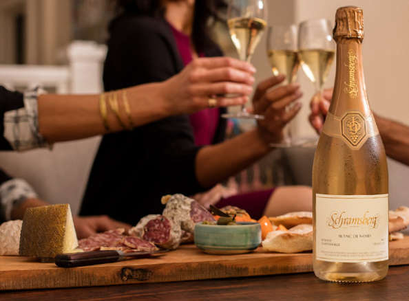 Schramsberg Blanc de Noirs toast paired with a charcuterie board